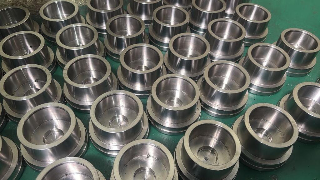 Precision machined conical components