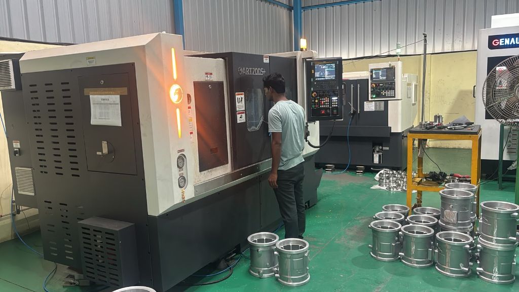 VEMTECH team operating CNC machines